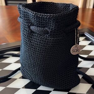 The Sak Black Crochet Drawstring Crossbody Bag